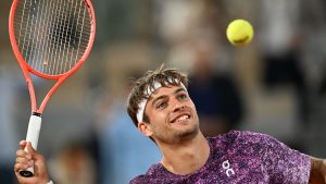 Italy's Flavio Cobolli reacts after winning the quarterfinal tennis match against Canada's Felix Auger-Aliassime at the French Open in Paris, Wednesday, June 3, 2026. (Emma Da Silva/AP)