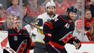 Carolina Hurricanes' Jaccob Slavin has the shot hit his arm with Vegas Golden Knights' Mark Stone and Carolina Hurricanes goaltender Frederik Andersen nearby during the second period in Game 1 of the NHL hockey Stanley Cup Final series in Raleigh, N.C., Tuesday, June 2, 2026. (Karl DeBlaker/AP)