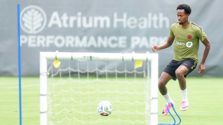 Canada midfielder Ali Ahmed runs a drill during Team Canada World Cup roster selection camp in Charlotte, N.C., on Wednesday, May 27, 2026. (Nathan Denette/CP)