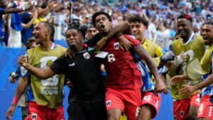 Cape Verde's Kevin Pina, center, celebrates with teammates after scoring the opening goal during the World Cup Group H soccer match between Uruguay and Cape Verde in Miami Gardens, Fla., Sunday, June 21, 2026. (AP Photo/Lynne Sladky)