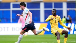 England's Declan Rice (4) controls the ball near Ghana's Jonas Adjetey (4) during the World Cup Group L soccer match between England and Ghana in Foxborough, Mass., near Boston, Tuesday, June 23, 2026. (AP Photo/Petr David Josek)