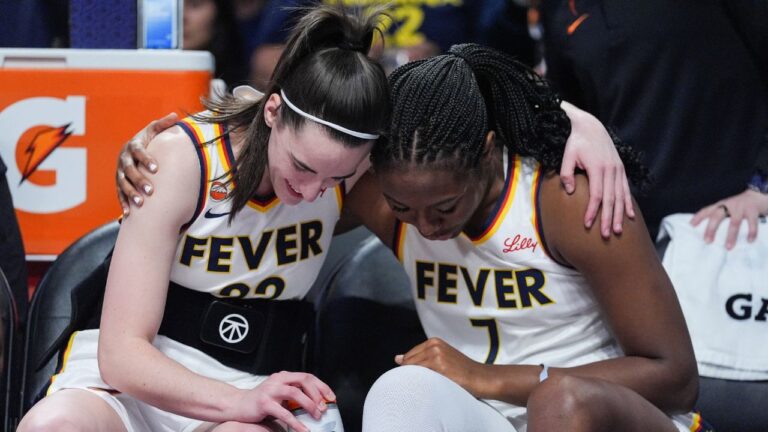 Indiana Fever's Caitlin Clark and Aliyah Boston share a moment before a game against the Los Angeles Sparks on Wednesday, May 13, 2026, in Los Angeles. (Jae C. Hong/AP)
