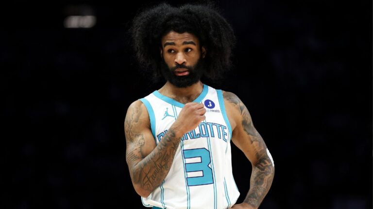 Charlotte Hornets guard Coby White (3) looks on during the first half of an NBA basketball game against the Minnesota Timberwolves, Sunday, April 5, 2026, in Minneapolis. (AP Photo/Matt Krohn)