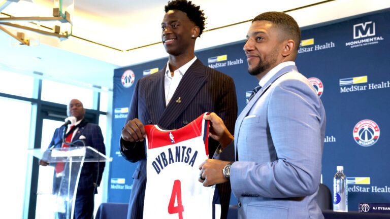 AJ Dybantsa receives his jersey from GM Will Dawkins at a news conference at InterContinental the Wharf in Washington on Thursday, June 25, 2026. (Tyler M. Andrews/AP)