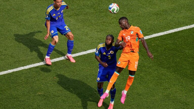 Ivory Coast's Nicolas Pepe (19) heads the ball near Curaçao's Sherel Floranus (5) and Curaçao's Deveron Fonville (24) during the World Cup Group E soccer match between Curacao and Ivory Coast in Philadelphia, Thursday, June 25, 2026. (AP Photo/Matt Slocum)