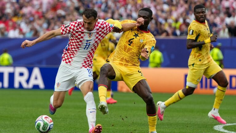 Croatia's Ante Budimir (11), and Ghana's Jonas Adjetey (4) battle for the ball during the World Cup Group L soccer match between Croatia and Ghana in Philadelphia, Saturday, June 27, 2026. (Matt Slocum/AP)