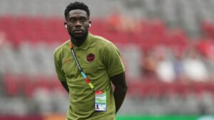 Canada's Alphonso Davies walks on the pitch as his team arrives prior to the World Cup Group B soccer match against Qatar in Vancouver, British Columbia, Thursday, June 18, 2026. (Abbie Parr/AP)