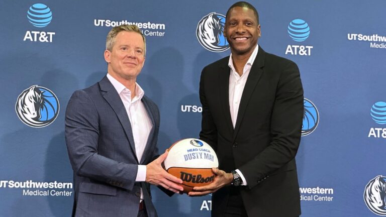 New Dallas Mavericks coach Dusty May poses with president of basketball operations Masai Ujiri during May's introductory news conference in Dallas on Monday, June 29, 2026. (Schuyler Dixon/AP)