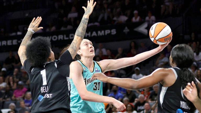 New York Liberty forward Breanna Stewart shoots a layup between Las Vegas Aces Kierstan Bell and Jackie Young during a game on Tuesday, June 23, 2026, in Las Vegas. (Steve Marcus/AP)