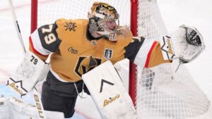 Vegas Golden Knights goaltender Carter Hart makes a glove save during the second period in Game 3 of the NHL hockey Stanley Cup Final series against the Vegas Golden Knights, Saturday, June 6, 2026, in Las Vegas. (AP Photo/Candice Ward)