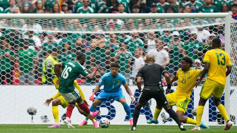 Mexico's Julian Quinones, left, attempts a shot at goal during the World Cup Group A match between Mexico and South Africa in Mexico City, Thursday, June 11, 2026. (Natacha Pisarenko/AP)