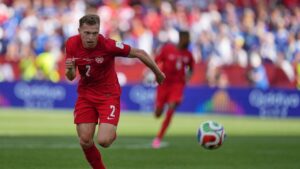 Canada's Alistair Johnston chases down a loose ball during the World Cup Group B match between Canada and Bosnia in Toronto, Friday, June 12, 2026. (Stephanie Scarbrough/AP)