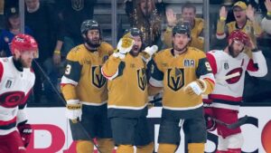 Vegas Golden Knights' Mark Stone, centre, celebrates his goal with Brayden McNabb, second from left, and centre Jack Eichel, second from right, as Carolina Hurricanes' Nikolaj Ehlers, left, and Jaccob Slavin skate away during the first period in Game 4 of the Stanley Cup Final series Tuesday, June 9, 2026, in Las Vegas. (John Locher/AP)