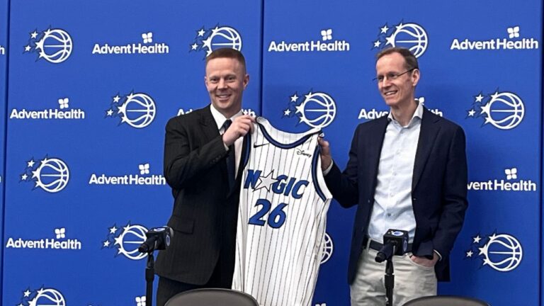 New Orlando Magic coach Sean Sweeney, left, is introduced by Magic president Jeff Weltman at the team's training facility Thursday, June 18, 2026, in Orlando, Fla. (Tim Reynolds/AP)