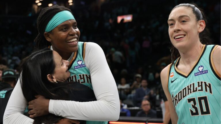 Toronto Tempo head coach Sandy Brondello with New York Liberty players Jonquel Jones and Breanna Stewart after a game in New York, Wednesday, June 3, 2026, in New York. (Heather Khalifa/AP)