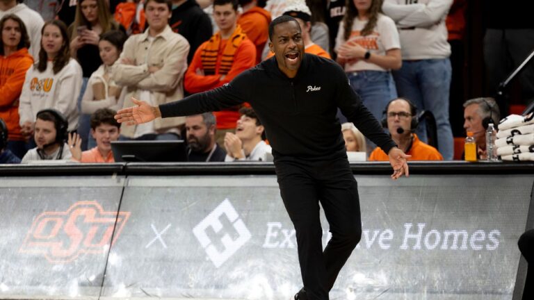 Former Oklahoma State head coach Mike Boynton reacts on the baseline in the first half of a game against Kansas, Tuesday, Jan. 16, 2024, Stillwater, Okla. (Mitch Alcala/AP)