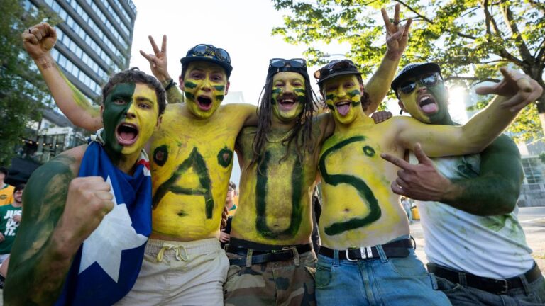 Australia fans march to the entrance of B.C. Place before a World Cup match in Vancouver, on Saturday, June 13, 2026. (Ethan Cairns/CP)