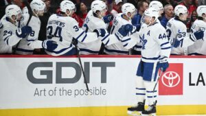 Toronto Maple Leafs defenceman Morgan Rielly (44) celebrates his goal during the first period of an NHL game against the Washington Capitals, Friday, Nov. 28, 2025, in Washington. (Nick Wass/AP)