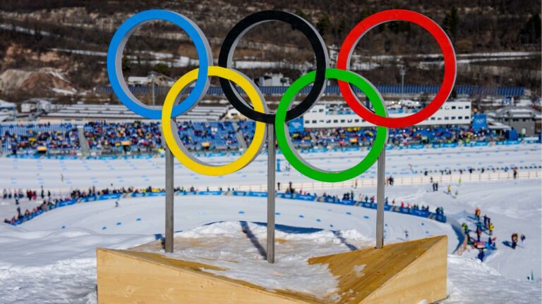 The Olympic rings stand above the cross country skiing course at the 2026 Winter Olympics, in Tesero, Italy, on Feb. 22, 2026. (Matthias Schrader/AP)