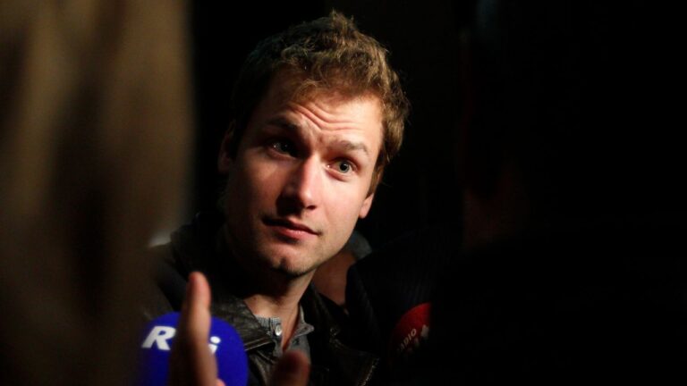 Italian race walker Alex Schwazer faces reporters as he leaves the Italian Olympic Committee headquarters in Rome. (Alessandra Tarantino/AP)