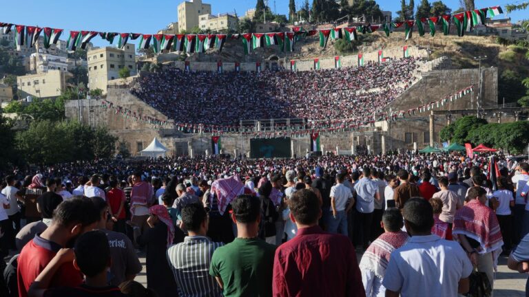 Fans watch the World Cup match between Jordan and Austria on a large screen at the Roman Amphitheater in downtown Amman, Jordan, early Wednesday, June 17, 2026. (Raad Adayleh/AP)