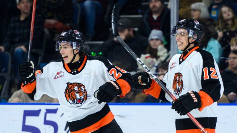Medicine Hat Tigers forwards Markus Ruck (26) and twin brother Liam Ruck (12). (HANDOUT - CANADIAN PRESS, Erica Perreaux/CP)
