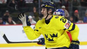Sweden Viggo Bjorck (21) controls the puck during the first period of an IIHF World Junior Hockey Championship gold medal game against Czechia, Monday, Jan. 5, 2026, in St. Paul, Minn. (Matt Krohn/AP)