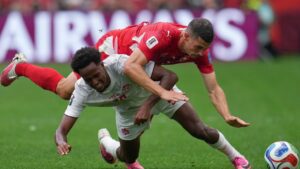 Canada's Ali Ahmed (20) and Switzerland's Remo Freuler (8) battle for the ball during the World Cup Group B soccer match between Switzerland and Canada in Vancouver, British Columbia, Wednesday, June 24, 2026. (Abbie Parr/AP)