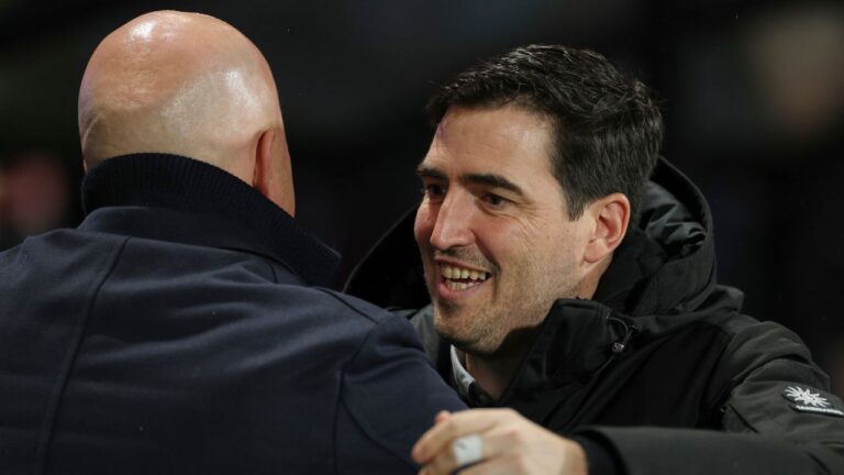 Bournemouth's head coach Andoni Iraola, right embraces Liverpool's manager Arne Slot prior to the start of the English Premier League soccer match between Bournemouth and Liverpool in Bournemouth, England, Saturday, Jan. 24, 2026. (Ian Walton/AP)