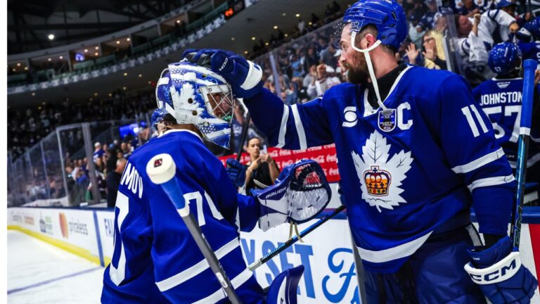 Toronto Marlies goalie Artur Akhtyamov (left) is congratulated by Logan Shaw after the team's win over the Chicago Wolves in Game 3 of the Calder Cup Finals. (Toronto Marlies photo)
