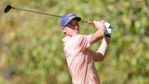 Virginia golfer Ben James hits a tee shot during an NCAA golf tournament on Friday, Oct. 24, 2025 in Alpharetta, Ga. (Stew Milne/AP)