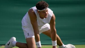 Ben Shelton of the United States reacts as he plays Otto Virtanen of Finland during their men's singles match at the Wimbledon Tennis Championships in London, Tuesday, June 30, 2026.(Brian Inganga/AP)
