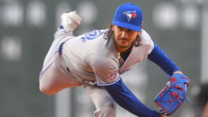 Toronto Blue Jays' Dylan Cease follows through on a pitch to a Boston Red Sox batter in the first inning of a baseball game, Tuesday, June 16, 2026, in Boston. (Steven Senne/AP Photo)