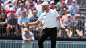 Wyndham Clark celebrates after a birdie on the 12th hole during the second round of the U.S. Open golf tournament at Shinnecock Hills Golf Club in Southampton, N.Y., Friday, June 19, 2026.(David J. Phillip/AP Photo)