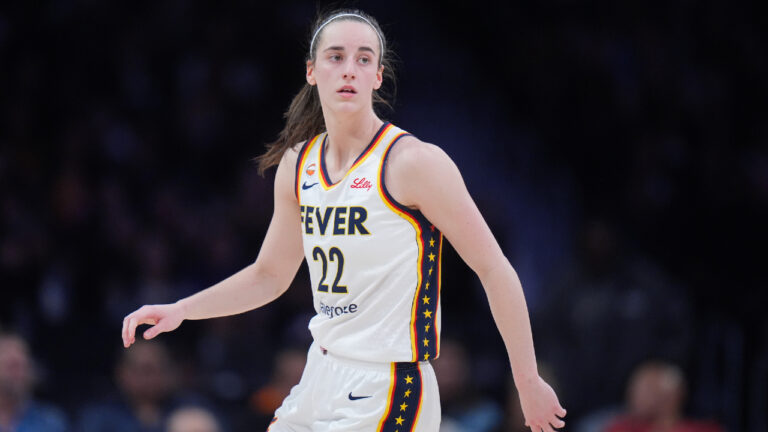 Indiana Fever guard Caitlin Clark (22) watches action during the first half of a WNBA basketball game against the Los Angeles Sparks Wednesday, May 13, 2026, in Los Angeles. (Jae C. Hong/AP)