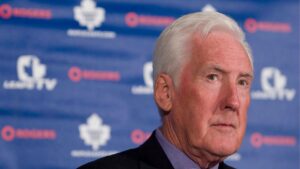 Cliff Fletcher listens to a question during a news conference where he was introduced as the Toronto Maple Leafs' interim General Manager during a news conference in Toronto, Tuesday Jan.22, 2007. (Adrian Wyld/CP)