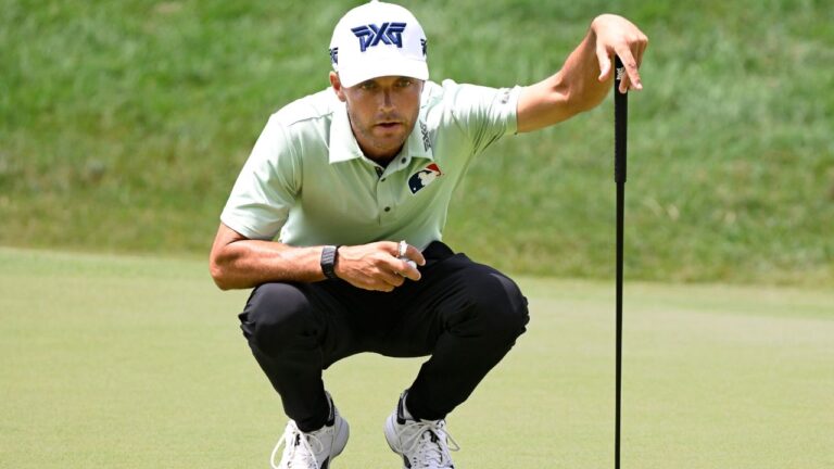 Eric Cole lines up his putt on the 18th green during the first round of the Travelers Championship golf tournament at TPC River Highlands, Thursday, June 25, 2026, in Cromwell, Conn. (Jessica Hill/AP Photo)