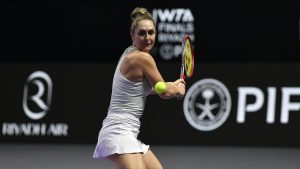 Canada's Gabriela Dabrowski plays a shot next to New Zealand's Erin Routliffe during their women's doubles match against Taylor Townsend of the U.S. and Katerina Siniakova of the Czech Republic in the final of the WTA finals at King Saud University Indoor Arena, in Riyadh, Saudi Arabia, Saturday, Nov. 9, 2024. (AP Photo)