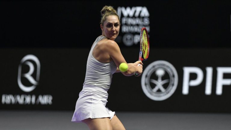 Canada's Gabriela Dabrowski plays a shot next to New Zealand's Erin Routliffe during their women's doubles match against Taylor Townsend of the U.S. and Katerina Siniakova of the Czech Republic in the final of the WTA finals at King Saud University Indoor Arena, in Riyadh, Saudi Arabia, Saturday, Nov. 9, 2024. (AP Photo)