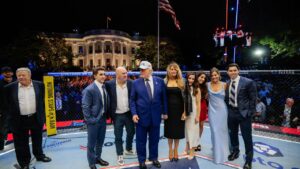 President Donald Trump, first lady Melania Trump, UFC President and CEO Dana White and other guests stand inside the octagon after UFC Freedom 250 on the South Lawn of the White House, Monday, June 15, 2026, in Washington. (Evan Vucci/Pool Photo via AP)