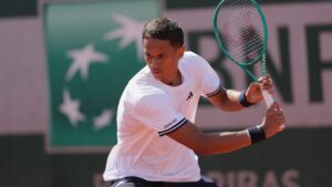 Canada's Gabriel Diallo in action during a first-round singles tennis match at the French Open tennis tournament in Paris, Sunday, May 24, 2026. (Dave Shopland/AP Photo)