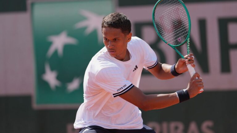 Canada's Gabriel Diallo in action during a first-round singles tennis match at the French Open tennis tournament in Paris, Sunday, May 24, 2026. (Dave Shopland/AP Photo)