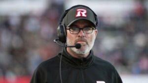 Ottawa Redblacks head coach Ryan Dinwiddie looks on during first-half CFL pre-season football action against the Montreal Alouettes in Montreal, Friday, May 22, 2026. (Peter McCabe/THE CANADIAN PRESS)