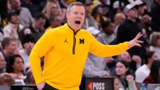 AP source: Mavericks hire Michigan’s Dusty May as new head coach