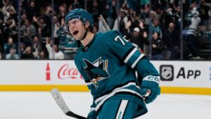 San Jose Sharks left wing William Eklund, left, celebrates after scoring a goal in the shoot-out of an NHL hockey game against the Minnesota Wild, Wednesday, Dec. 31, 2025, in San Jose, Calif. (Godofredo A. Vásquez/AP)