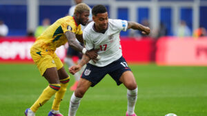 Ghana's Kwasi Sibo (8), left, fights for the ball with England's Morgan Rogers (17) during the World Cup Group L soccer match between England and Ghana in Foxborough, Mass., near Boston, Tuesday, June 23, 2026. (Martin Meissner/AP)