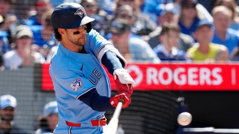 Toronto Blue Jays' Ernie Clement (22) hits a three run home run during third inning MLB baseball action against the Baltimore Orioles, in Toronto, Saturday, June 6, 2026. (Frank Gunn/CP)