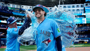 Toronto Blue Jays' Myles Straw, left, douses teammate Ernie Clement with sports drink following MLB baseball action against the Baltimore Orioles, in Toronto, Saturday, June 6, 2026. (Frank Gunn/CP)