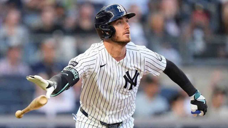 New York Yankees' Cody Bellinger (35) tosses his bat as he watches the ball he hit for a two-run home run during the first inning of a baseball game against the Chicago White Sox Wednesday, June 17, 2026, in New York. (Frank Franklin II/AP)
