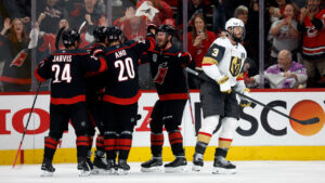 Carolina Hurricanes celebrate a goal by Andrei Svechnikov, center, as Vegas Golden Knights' Brayden McNabb (3) skates away during the third period in Game 5 of the NHL hockey Stanley Cup Final series in Raleigh, N.C., Thursday, June 11, 2026. (Karl DeBlaker/AP)